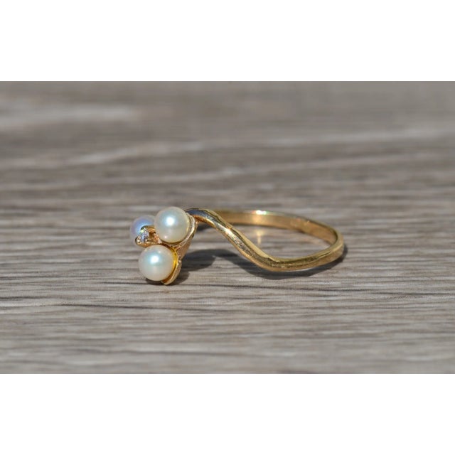The Ellison Ladies Vintage Pearl and Diamond Ring in 10K. Expertly crafted in 10 karat yellow gold, this ladies ring...