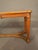 An elegant 19th-century French walnut and cane bench, circa 1880, featuring a beautifully hand-caned seat, intricate...