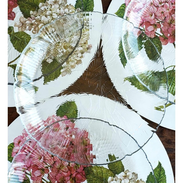 This beautiful set of 4 vintage clear glass dinner plates was manufactured by Arcoroc in France. Featuring the elegant...