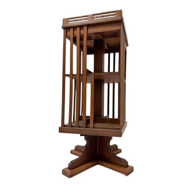 Stunning Art Nouveau Jugendstil revolving bookcase. Striking Dutch design from the 1900s. Solid oak and the wheels are in...