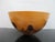Stunning turned Norfolk Island Pine wood bowl, crafted by artist Jess Craig in Hawaii, featuring distinctive dark knots in...