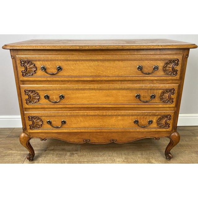 Bring timeless French elegance into your home with this beautiful Vintage French Louis Chest of Drawers , crafted from oak...