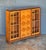 A period Art Deco Era display cabinet or bookcase from the 1930s, by the celebrated furniture makers, Heal's of London....