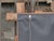 A petite French Turn of the Century hand-carved wooden Tramp Art mirror from circa 1900 with protruding corners. Immerse...