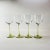 A beautiful set of vintage spring green stemmed wine glasses in very good condition.