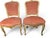 A charming pair of vintage French Provincial Louis XV-style accent chairs featuring gracefully carved cabriole legs, a...