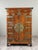 Superb Japanese tansu-style cabinet in wood with a beautiful patina, richly adorned with decorative brass fittings. The...