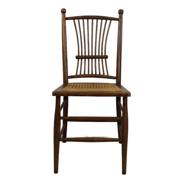 Antique Oak Chair With Unique Turned Wood Back and Caned Seat For Sale