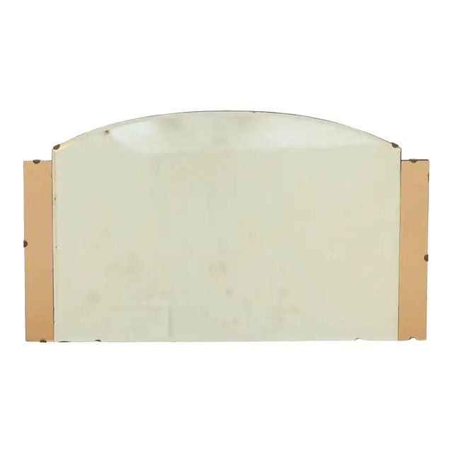A fine vintage English wall mirror from the Art Deco era, featuring a geometric design, with beveled mirrored glass around...