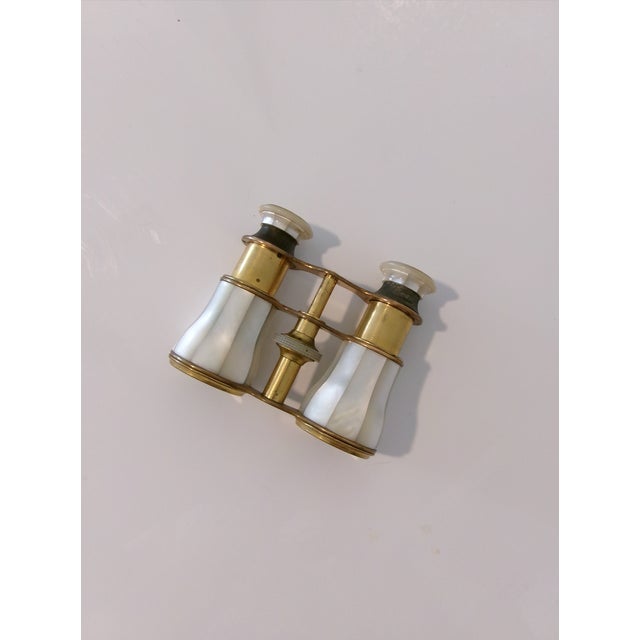 Early 20th Century Lemaire Paris Mother of Pearl and Brass Opera Glasses. Lemaire Paris Inscription written on the pearl...