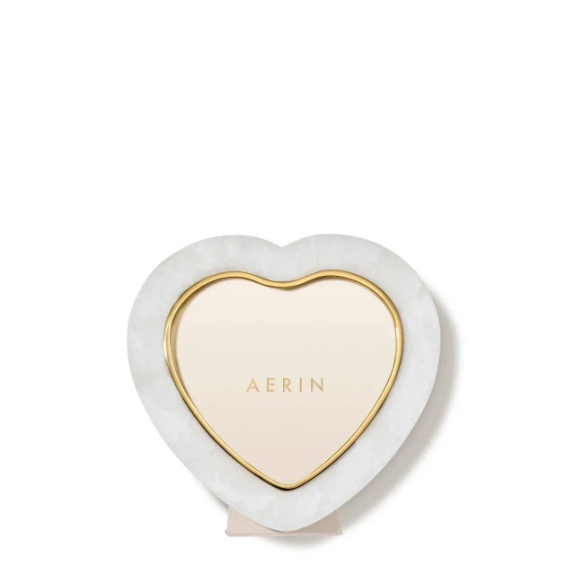 One of the recurring motifs in the AERIN collection, the heart is also a beautiful shape for a frame. This white quartz...