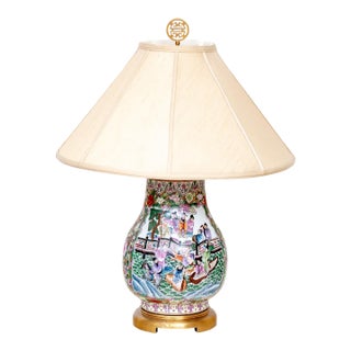 Chinese Famille Rose Millefleurs Hu-Form Porcelain Table Lamp | Figural Scenes | Mid-20th Century | With Shade For Sale