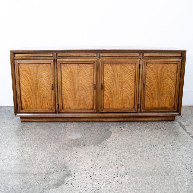 Clean 3 drawer, 4 door credenza by Basic Witz, an American furniture maker during the 60s era. Tons of storage throughout...
