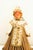 One-of-a-kind Christmas golden glitter cone angel. She has a soft angel face and head made of rubber. She wears a pretty...