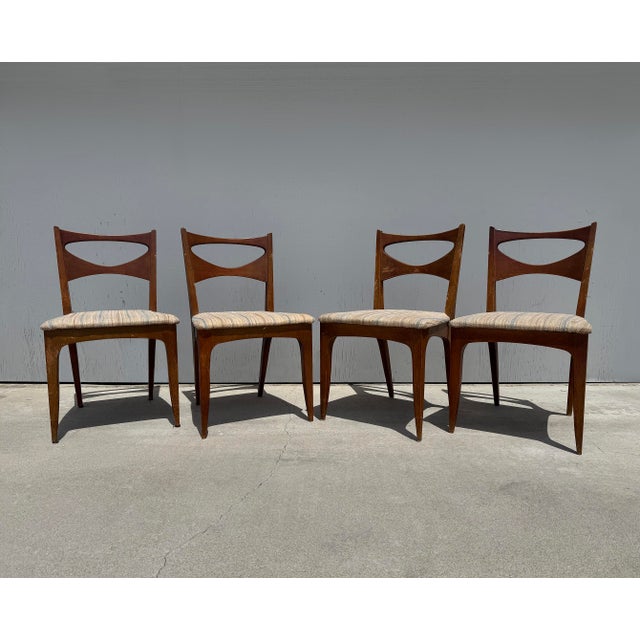 This is a set of 4 'Profile' dining chairs, designed by John Van Koert for Drexel and produced from 1955 to around 1960....