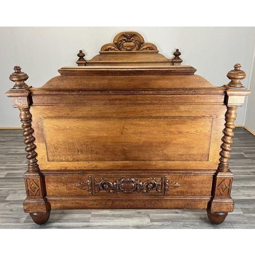 This impressive Antique French double bed is a striking and substantial piece, showcasing rich period craftsmanship and...