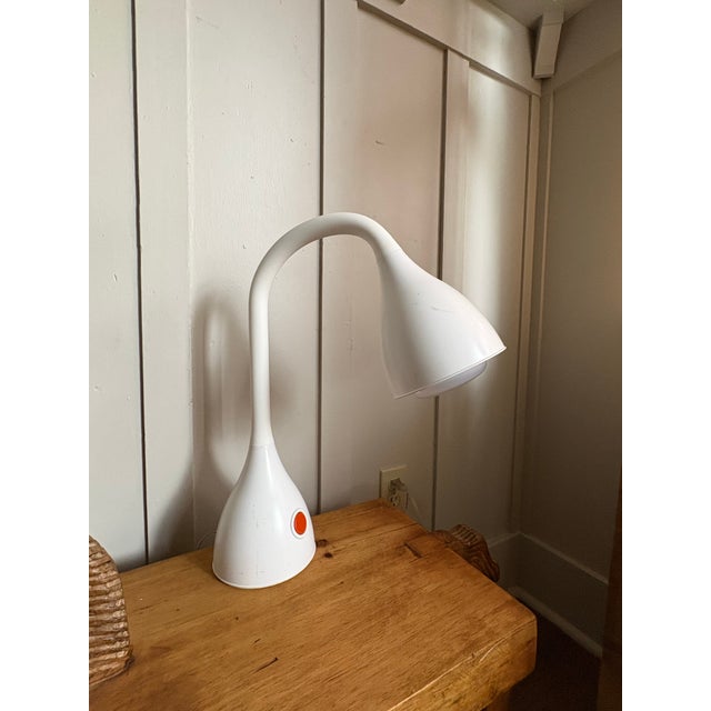 Postmodern gooseneck desk lamp designed by renowned American architect and designer Michael Graves. This sculptural lamp...