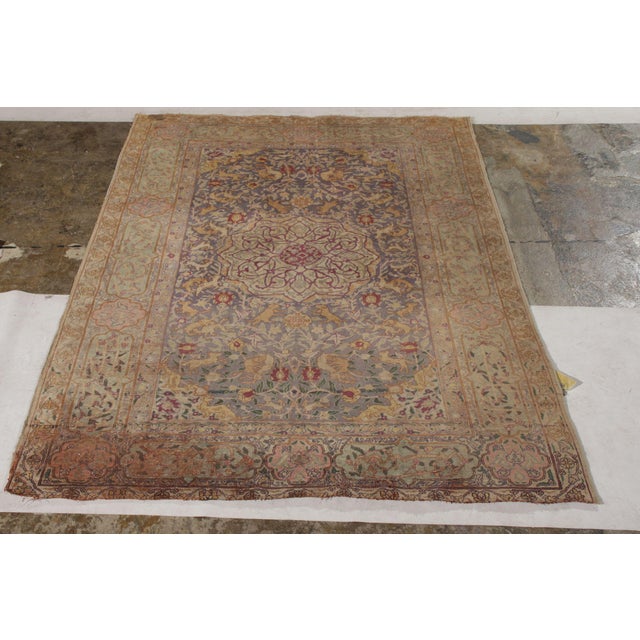 A 4x6 antique rug connoting a rare Kayseri design, hand-knotted in all silk originating from Turkey circa njoying a unique...