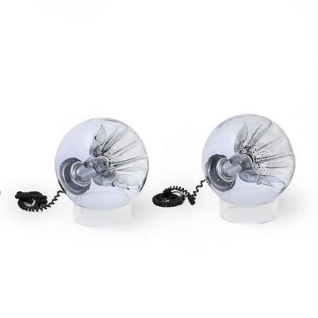 Pair of Italian manufacturing table lamps produced in the 70s. Support base in transparent acrylic. Body lamp in hand...