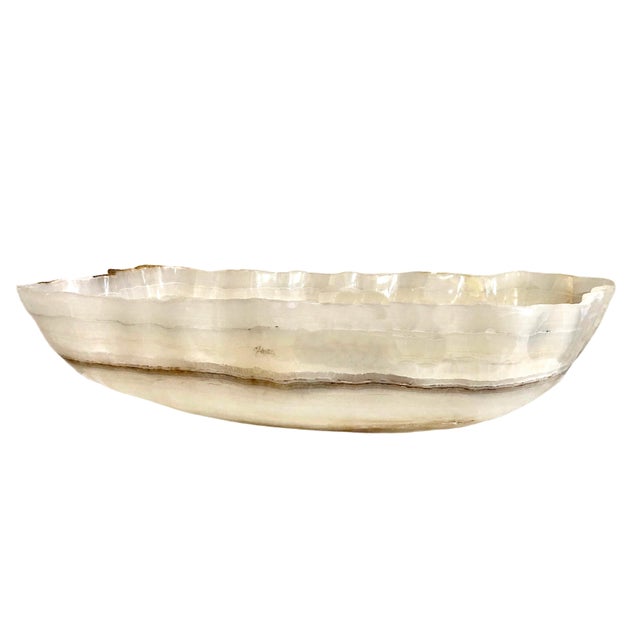 Sometimes man and nature work in harmony. Nature to form such a stone as this chunk of onyx, slowly through the...