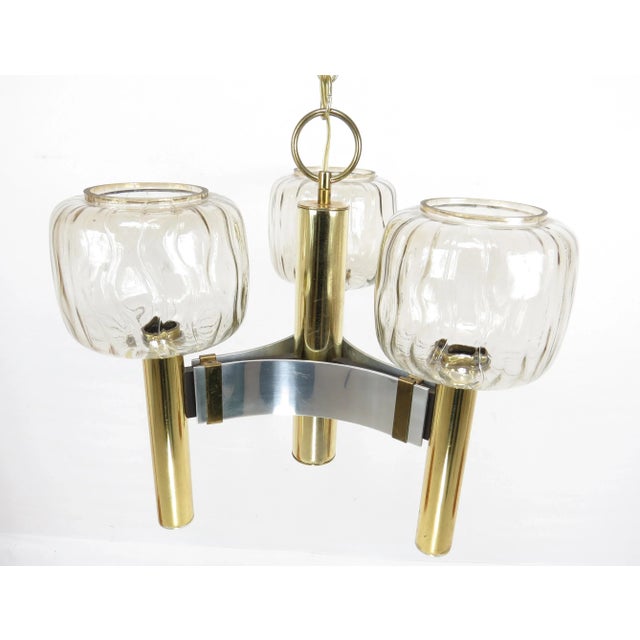 Vintage triangular brass and chrome pendant light attributed to Gaetano Sciolari. Features 3 subtle grayish brown smoked...