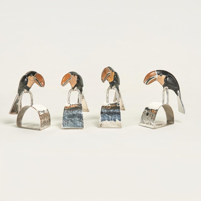 Chic mid century set of twelve napkin rings handcrafted in silver on hammered copper in modern form featuring stone clad...