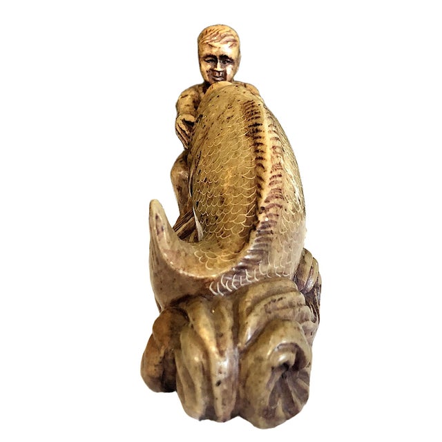 On offer is a classic piece of Chinese folk art depicting a traditional, auspicious motif, namely a young boy wrestling a...