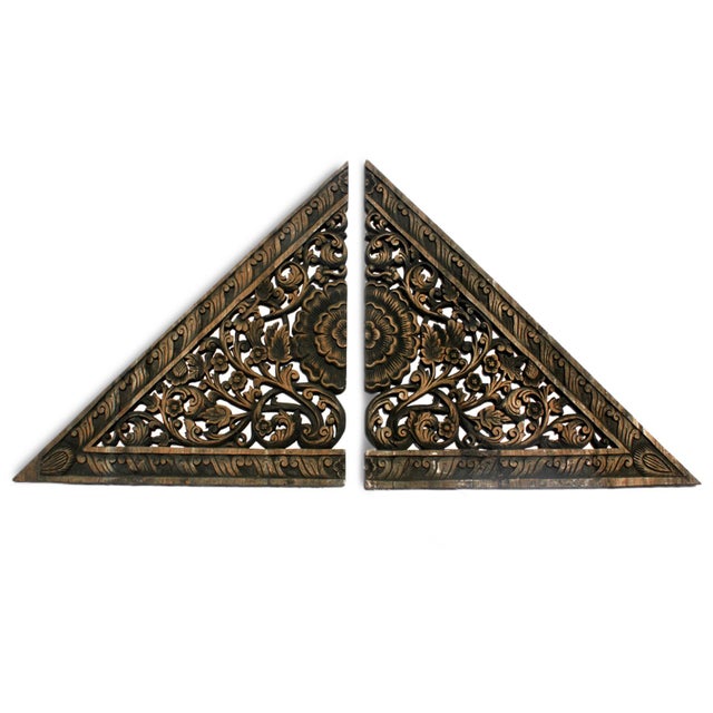 Vintage hand carved teak floral triangular panel from Burma (Myanmar). Beautiful brown antique burn finish. Sold as a set...