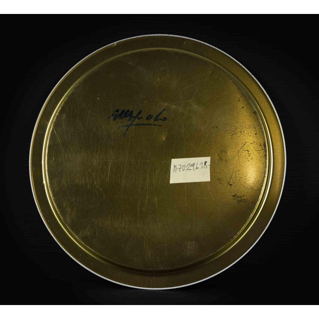 Ugo Nespolo plate is an original decorative object realized in the half of 20th century by the Italian artist Ugo Nespolo....