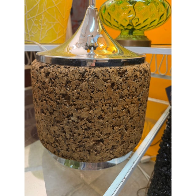 Fabulous pair of cork and chrome lamps. The cork is in superb excellent vintage condition. These drum-style lamps became...