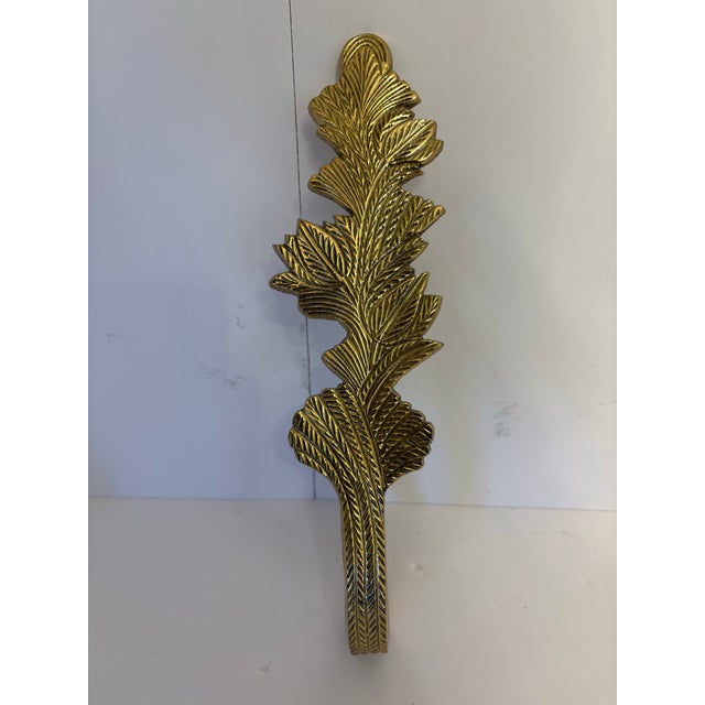 These leaf motif tiebacks are oftern assoiciated with Hollywood Regency and are made in India. They have a gold like...