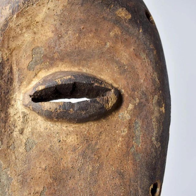 The Lega, also known as Warega, reside along the Lualaba River near Lake Tanganyika in the DRC, governing themselves...