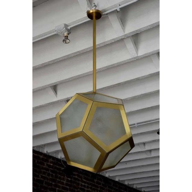 Large geometric pentagon hanging lantern, Circa 1920 design. Adjustable rod, textured glass panes, matching canopy. One...