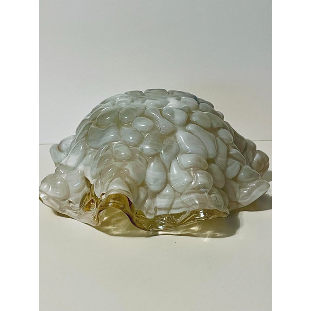 Elevate your tablescape or console with this striking, substantial mid-century Italian art glass centerpiece bowl,...