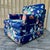Vintage Hollywood Regency Floral Print Upholstered Lounge Chair. Circa 1970s Features a vibrant floral fabric print...