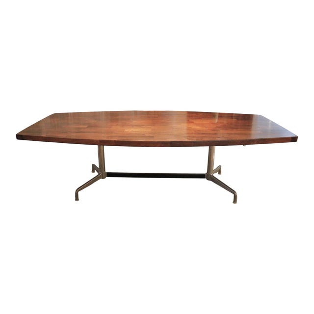 Eames for Herman Miller attributed dining or conference table circa 1970. The beautifully grained solid wood tabletop is...