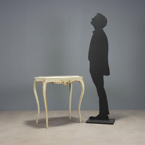 Antique coffee table in lacquered wood. Marble top supported by four curved legs, rocaille carvings on the band below the...