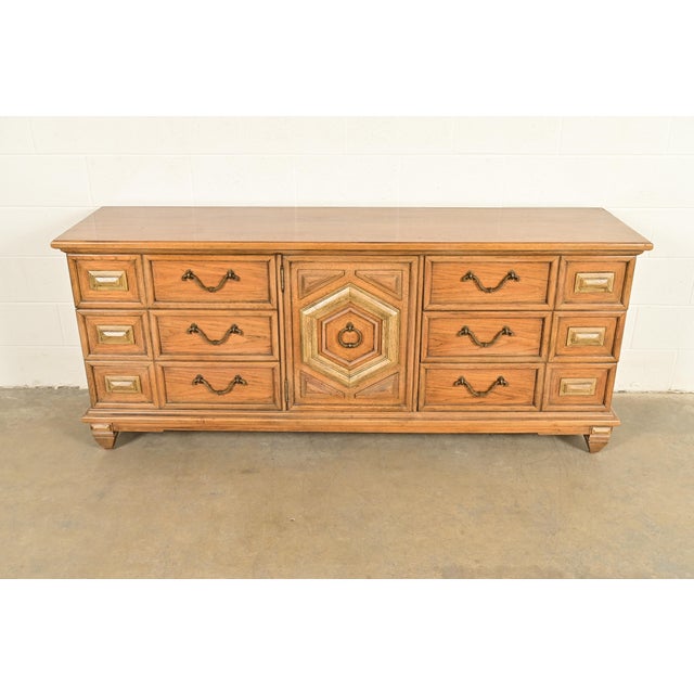A gorgeous Spanish Mediterranean or Spanish Colonial style nine-drawer triple dresser or credenza By Thomasville USA,...