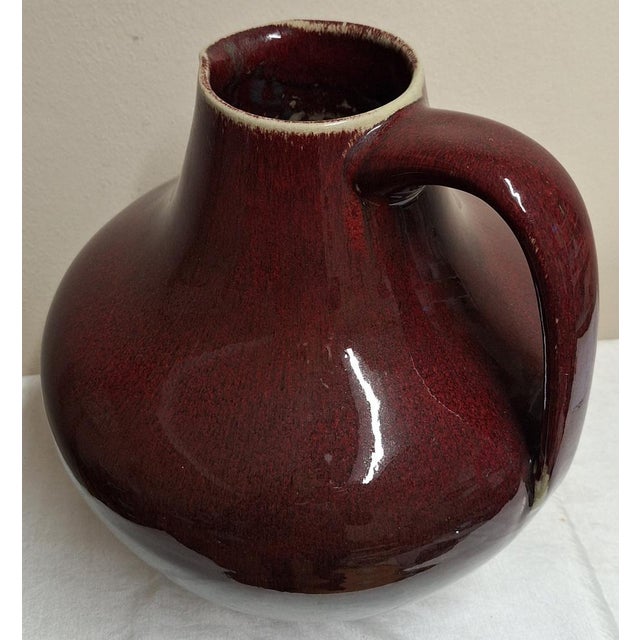 Mid-Century Ceramic Vase in the Shape of a Jug with a Red-Brown Oxblood Glaze by Peter Delius for Hamelner Töpferei,...