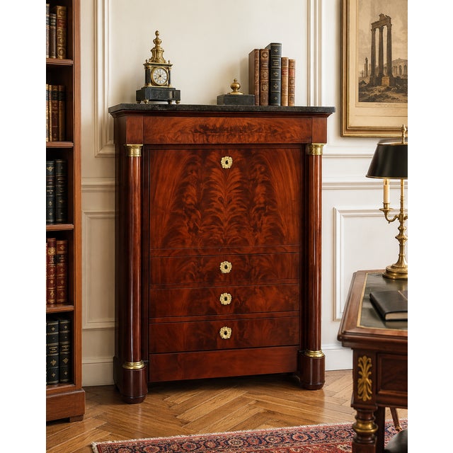 A masterpiece of balance, symmetry, and aristocratic restraint, this French Empire secrétaire à abattant embodies the...