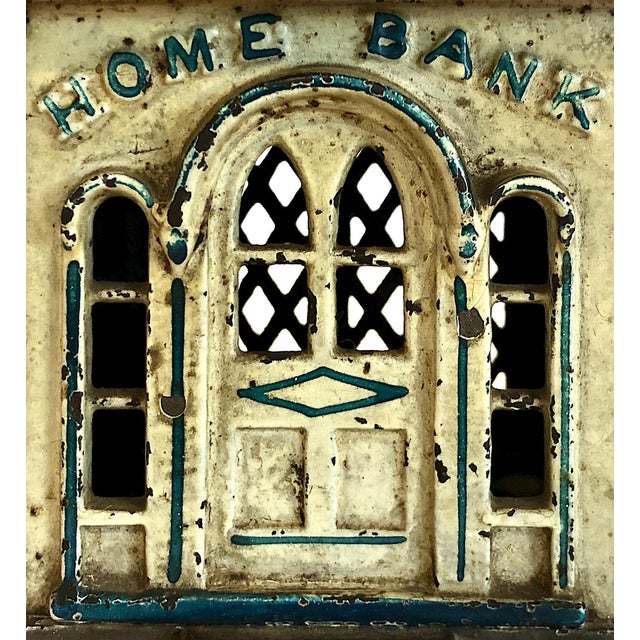 On offer is an original "Home Bank" with a morning glory/scalloped finial on the roof. Originally patented in 1872 by the...