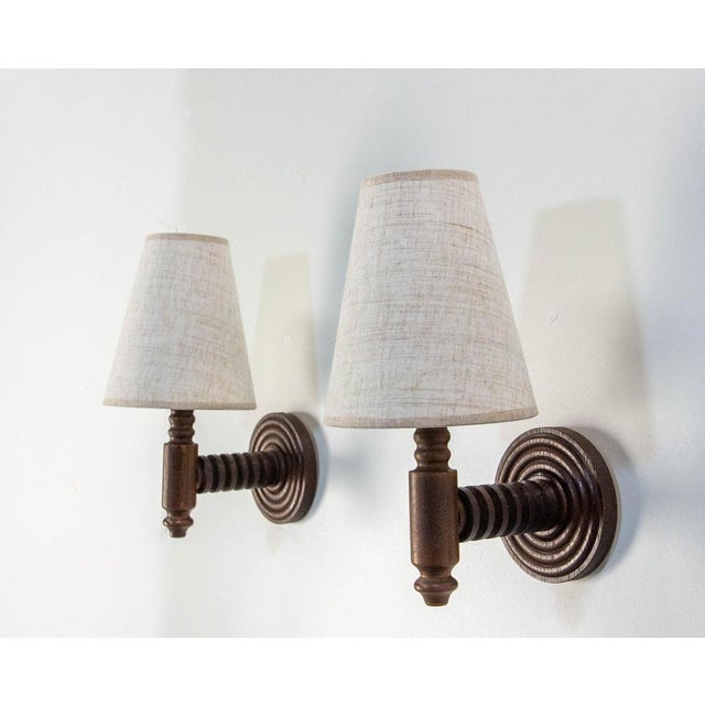 French wall sconces pair of lights, made by Dudouyt These sconces are made of massive beech. These wall lights feature the...