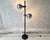 Very rare Temde Lechten floor light with two chrome spheres on a black stained wooden base. The two lights are...