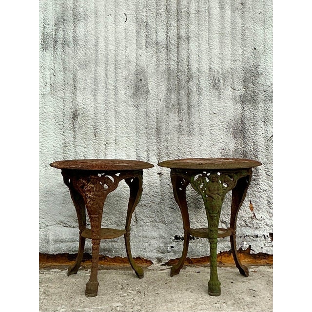 Infuse your space with rustic charm using this stunning pair of Vintage Boho Patinated Wrought Iron Tables, where old-...