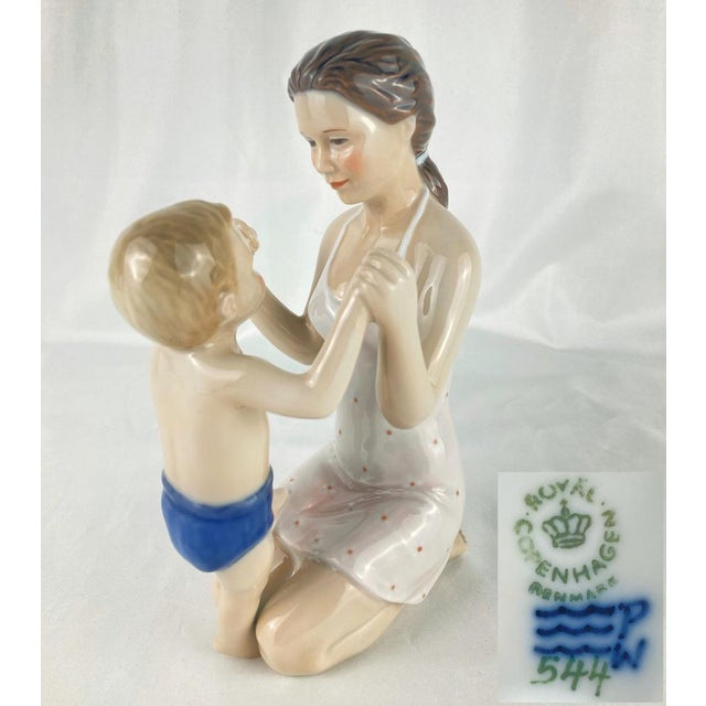 Mother with Baby Figurine from Royal Copenhagen, 2000s, in Flawless conditions. Designed from 2000 This piece has an...