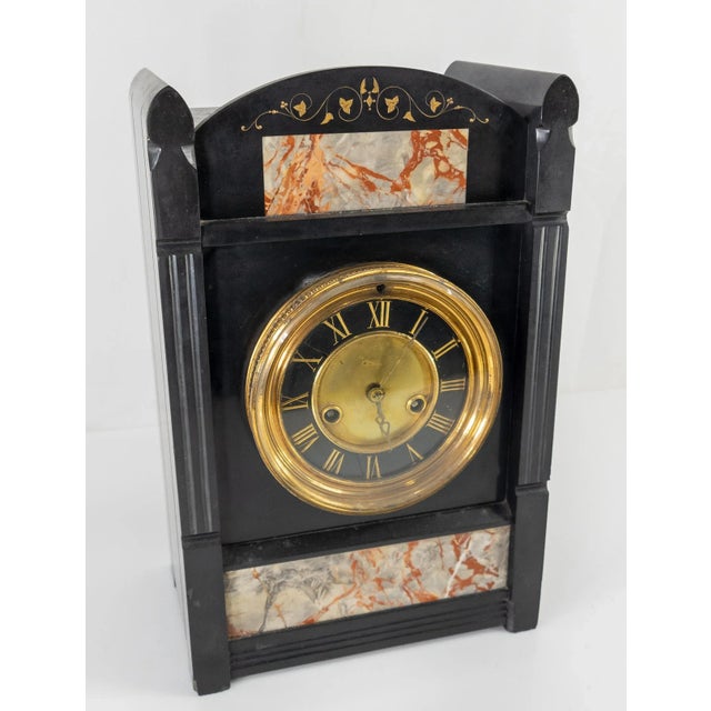 We are selling this antique stylish Aesthetic movement clock by Seth Thomas made from Black marble from the late 19th...
