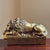 Offering a gorgeous cast brass (or possibly bronze) lion figure in repose after the works of 19th century Italian sculptor...