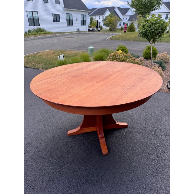 Beautiful round dining table with 4 matching chairs from McKinnon Furniture, a renowned Seattle-based craftsman known for...
