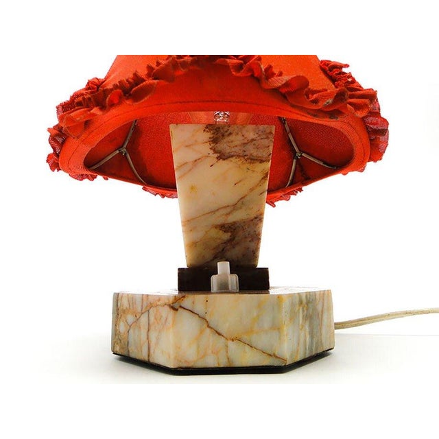 The table lamp was produced in Czechoslovakia in the 30s. It is preserved in very good condition. This piece has an...