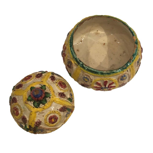 A round faience box with florals and fruit from Italy and is in great condition for age.